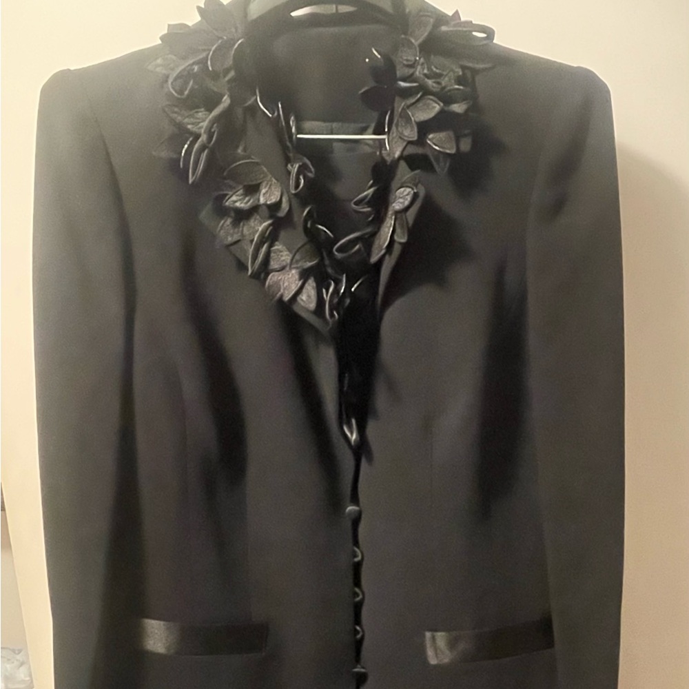Two piece suit, black.